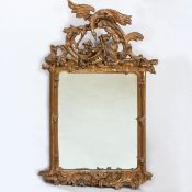 Wandspiegel mit Adler 19. Jh. Holz. Gips. H. 118 cm. B. 74 cm. Best.