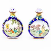 Paar Snuffbottles China. Email. H. je 5,8 cm. Die Schauseiten mit fein gemalten, figuralen Sz