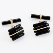 Paar Manschettenknöpfe mit Onyx 750/- Gelbgold, gestemp. Gewicht: 6,6 g. 2 Onyxe. Maße: 1,6