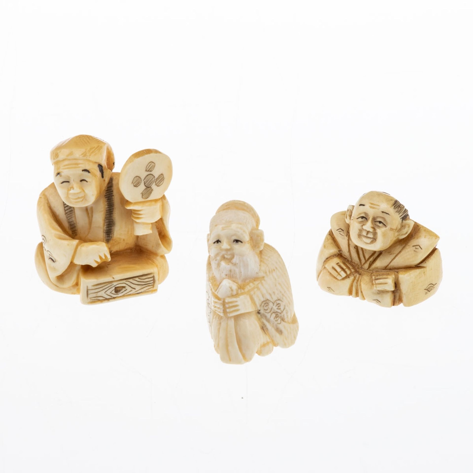 Drei Netsuke, Japan um 1900