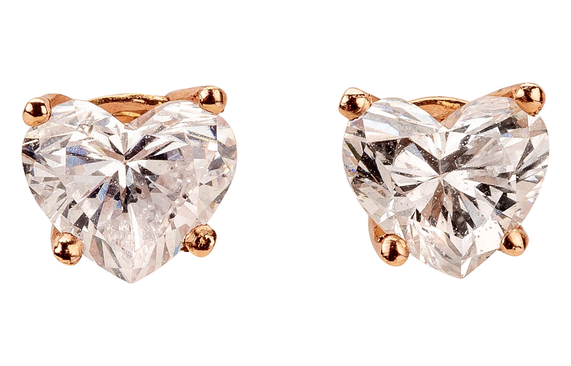 Pair of rose gold ear studs with heart-shaped diamonds