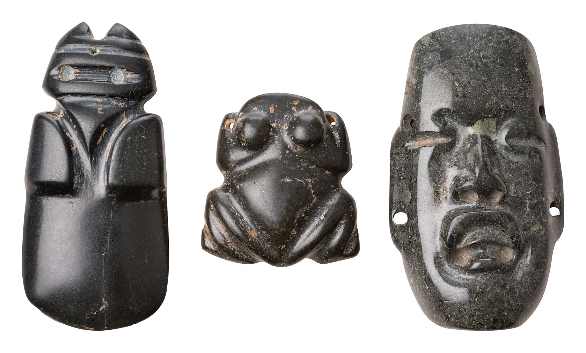 Pendant collection of a stylised bird, frog and mask