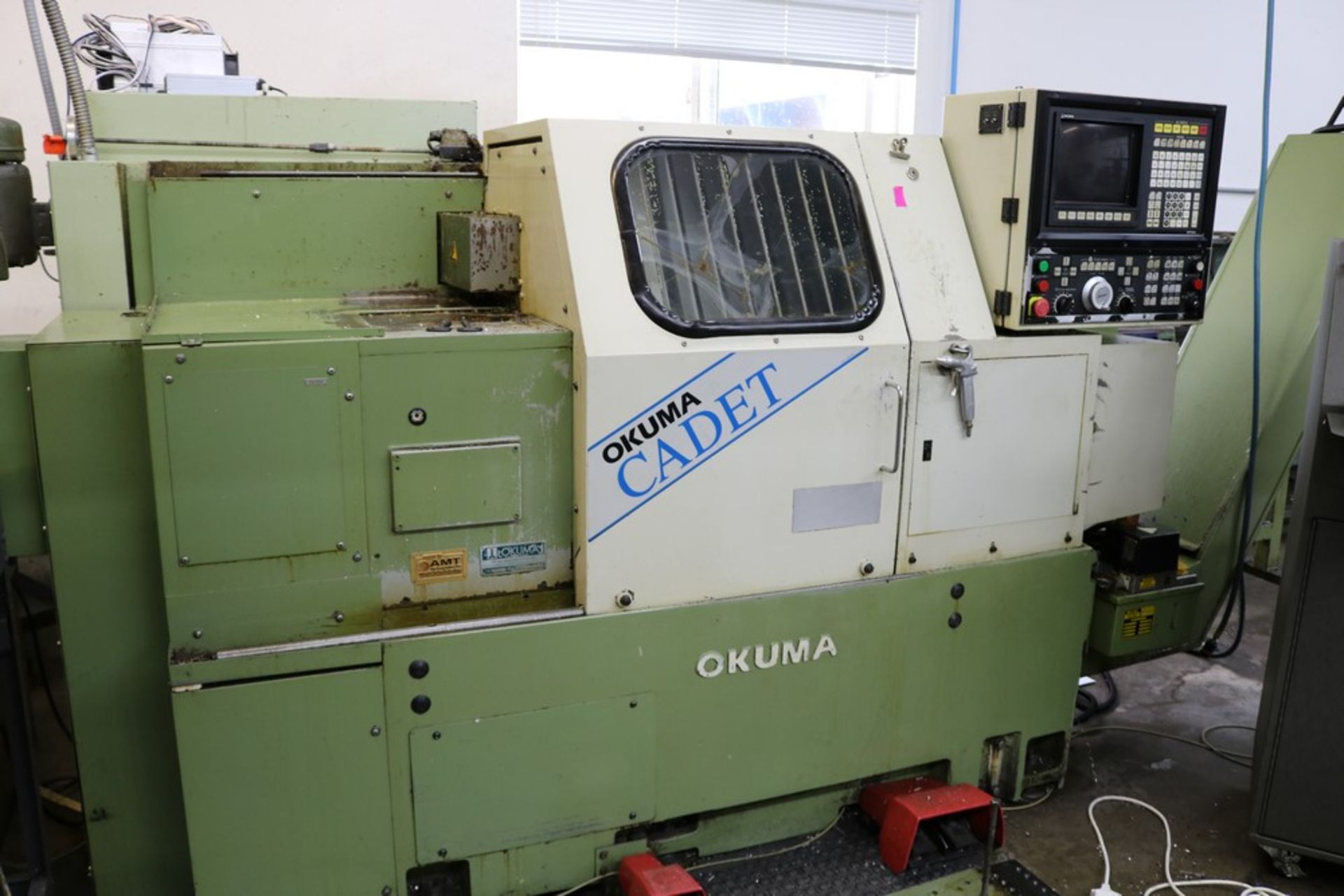 1990's Vintage Okuma Cadet LNC-8 CNC Turning Center, 12 Station Turret, Traveling Tailstock, Okuma