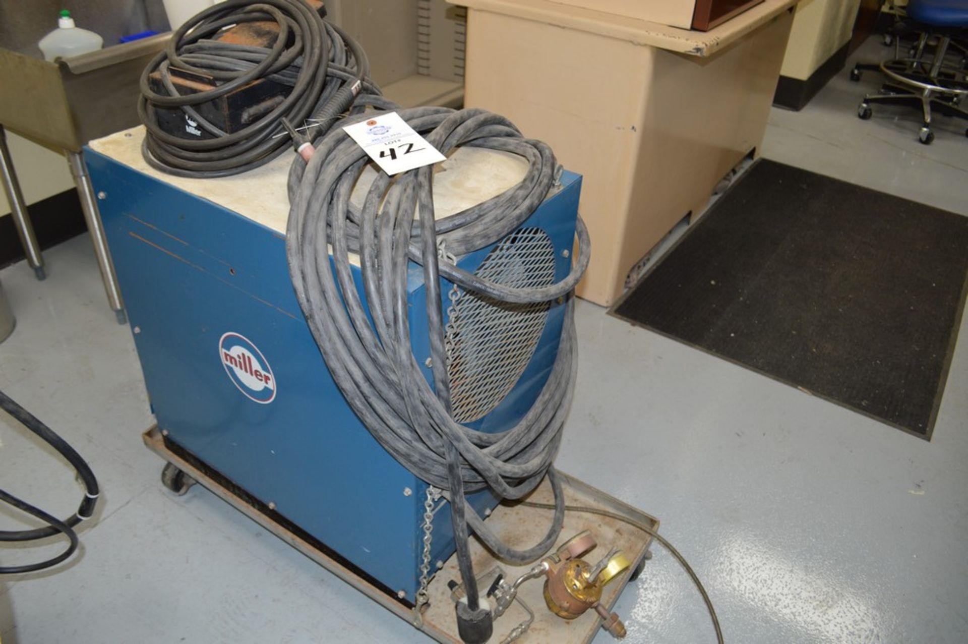 Miller SR-150-32 DC Welder on metal rolling cart, foot pedal and gas lines included