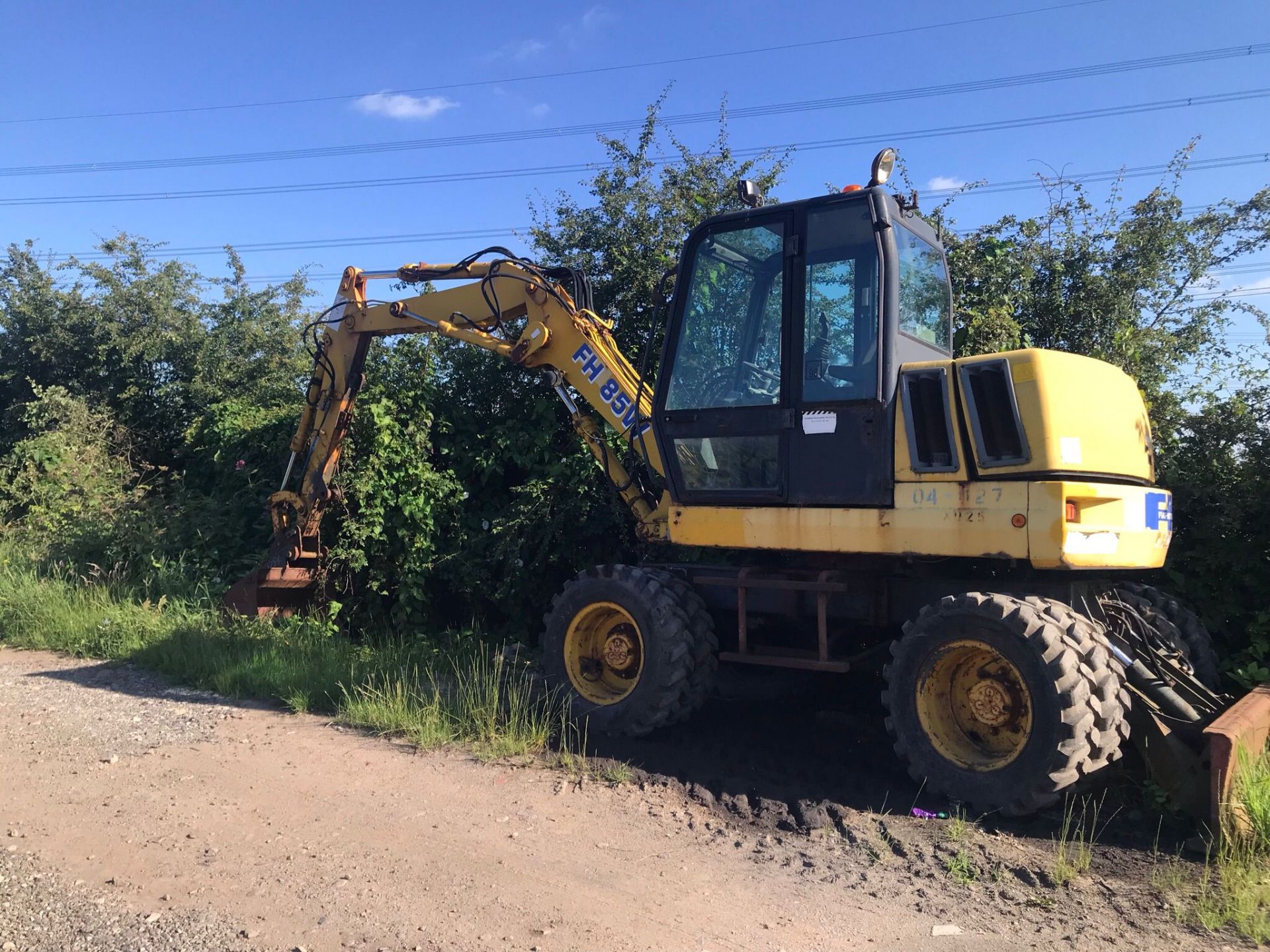 fiat hatachi 808 four wheel drive four wheel steer escovators