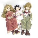 Two bisque headed dolls, cloth and composite bodie