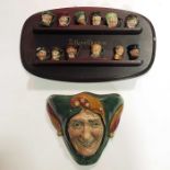 A Royal Doulton wall pocket, Jester, impressed mar