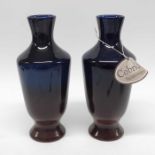 A pair of Cobridge ware vases, waisted cylindrical