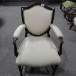 A Hepplewhite style upholstered armchair