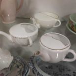 A Coalport creamware pap boat, and two other examp