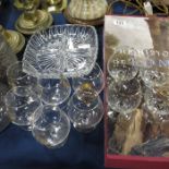 Six large and five small brandy glasses together with a four division nibble dish