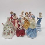 A collection of nine Royal Doulton figure, to incl
