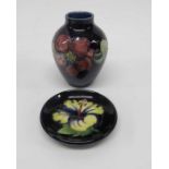 A Moorcroft hibiscus pattern pin dish, together wi