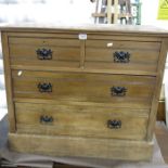 An Edwardian chest of two short over three long drawers