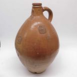 A large Bellarmine stoneware jug, with ferruginous
