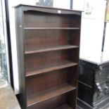 A Stag dark stained five tier bookcase, with adjus