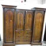 A large early Victorian three bay mahogany wardrob