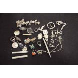 A selection of silver jewellery, to include a charm bracelet
