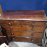 A mahogany chest of two short over three long drawers