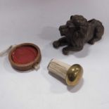 A cast bronze figure of a lion,a wax seal and a paper creaser