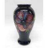 A Moorcroft Limited Edition anemone on blue vase,