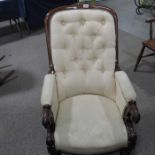 An early Victorian mahogany button back armchair