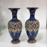 A pair of Doulton Lambeth stoneware vases, baluste