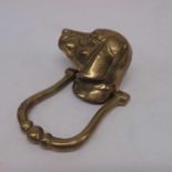 A Cast brass dog's head door knocker.