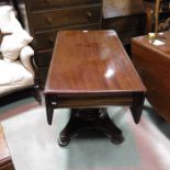 A mahogany drop flap breakfast table