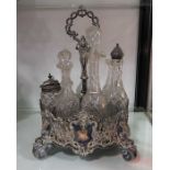 A silver plated cruet stand, fitted seven glass cr