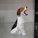 A Royal Doulton figure of a yawning hound, 11 cm h