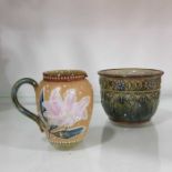 A Royal Doulton stoneware cream jug, tube-lined and pai