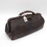 A leather Doctor's bag, A brass Art Deco desk ligh