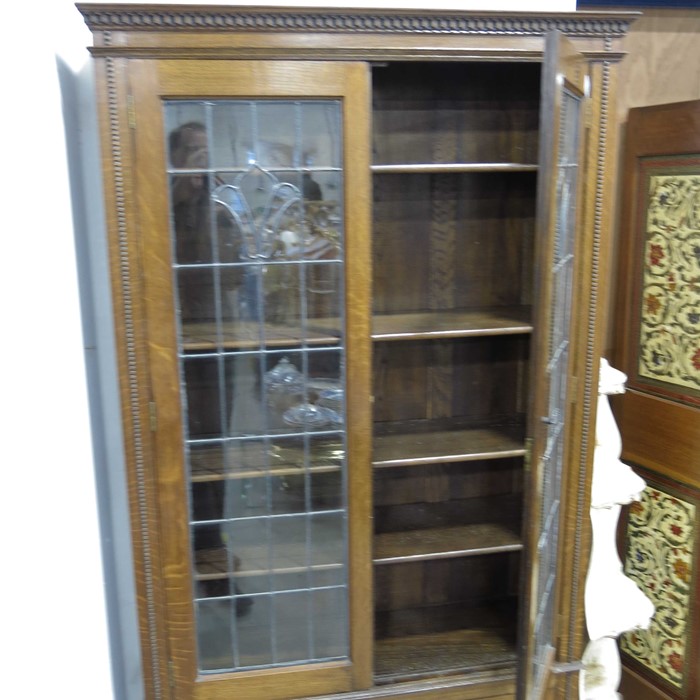 A 1920s oak and lead glazed bookcase cabinet, with - Image 2 of 2