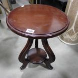 A mahogany occasional table