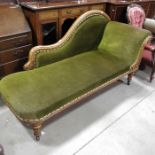 An oak framed chaise longue