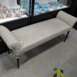 Upholstered scroll arm bedroom seat