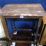 An oak side table with barley twist legs