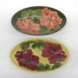 Walter Moorcroft hibiscus on yellow pattern bowl;