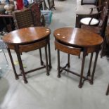 A pair of Theodore Alexander burr walnut veneered