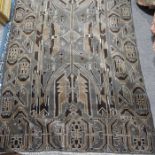 A large Tribal style Afghan rug, geometric brown a