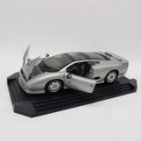 A Maisto die-cast Jaguar XJ220 1:12 scale model ca