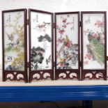 A Chinese four-fold screen, painted panels