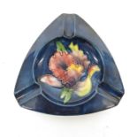 William Moorcroft orchid pattern ashtray, triangul