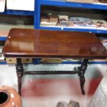 A mahogany side table, on spiral turned trestle st