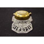 A Victorian moulded glass and brass inkwell, of oc