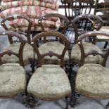 A Victorian walnut and upholstered salon suite inc