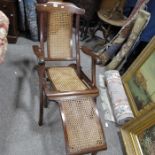 A Folding woven cane seated chair