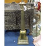 A brass Corinthian column table lamp, on square an