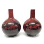 A pair of Royal Doulton Flambe vase, bottle form,